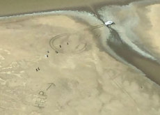 ‘Help’ Sign in Mud Saves Australian Couple - World News II